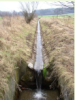 Straightened ditches for evacuating water
